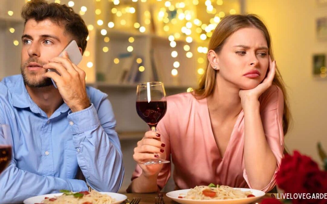 Phubbing in Relationships Man at dinner on phone distraction effects improve relationship communication relationship satisfaction emotional connection screen time and intimacy